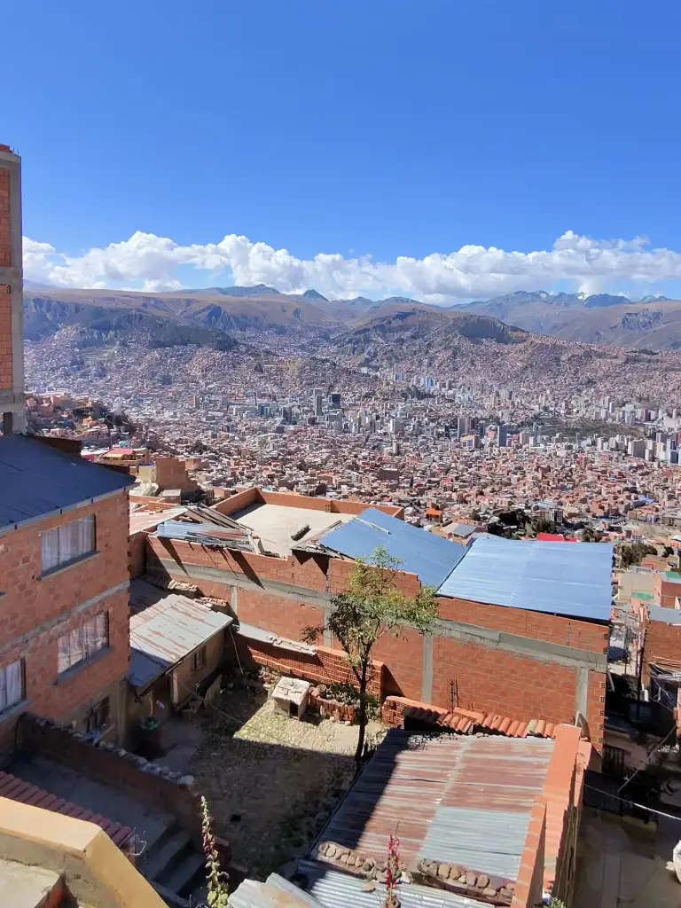 Panoramic view of La Paz city and the surrounding mountains captured on a motorcycle trip.